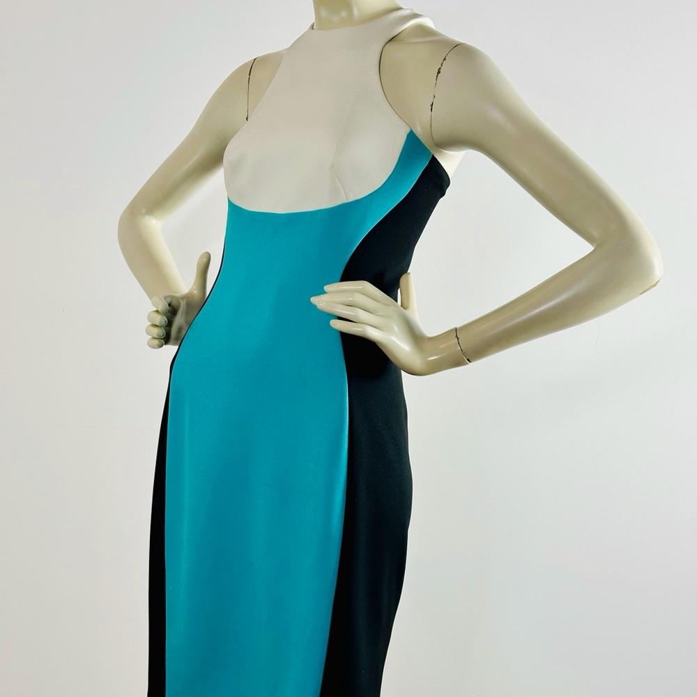 Maggy London Size 4. Turquoise Black and White. Back Zipper Closure.